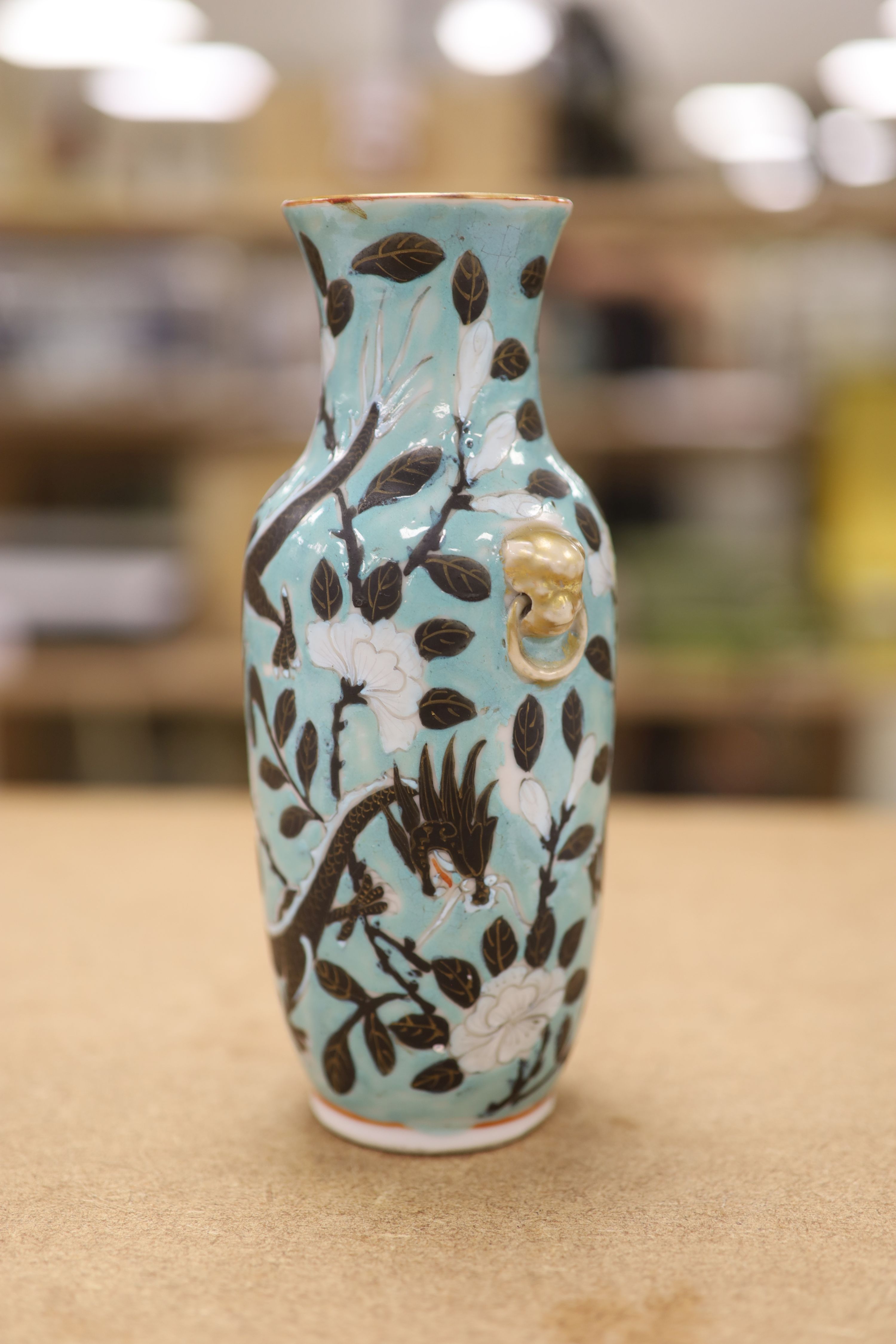 A Chinese turquoise glazed 'dragon' vase, c.1900, height 18cm